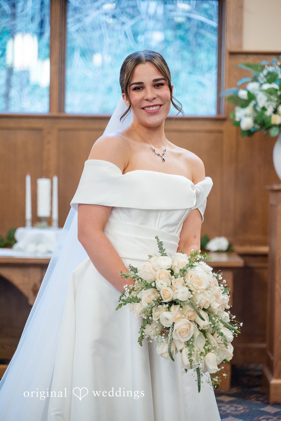 Avery + Ben Lovely bride posing with bouquet