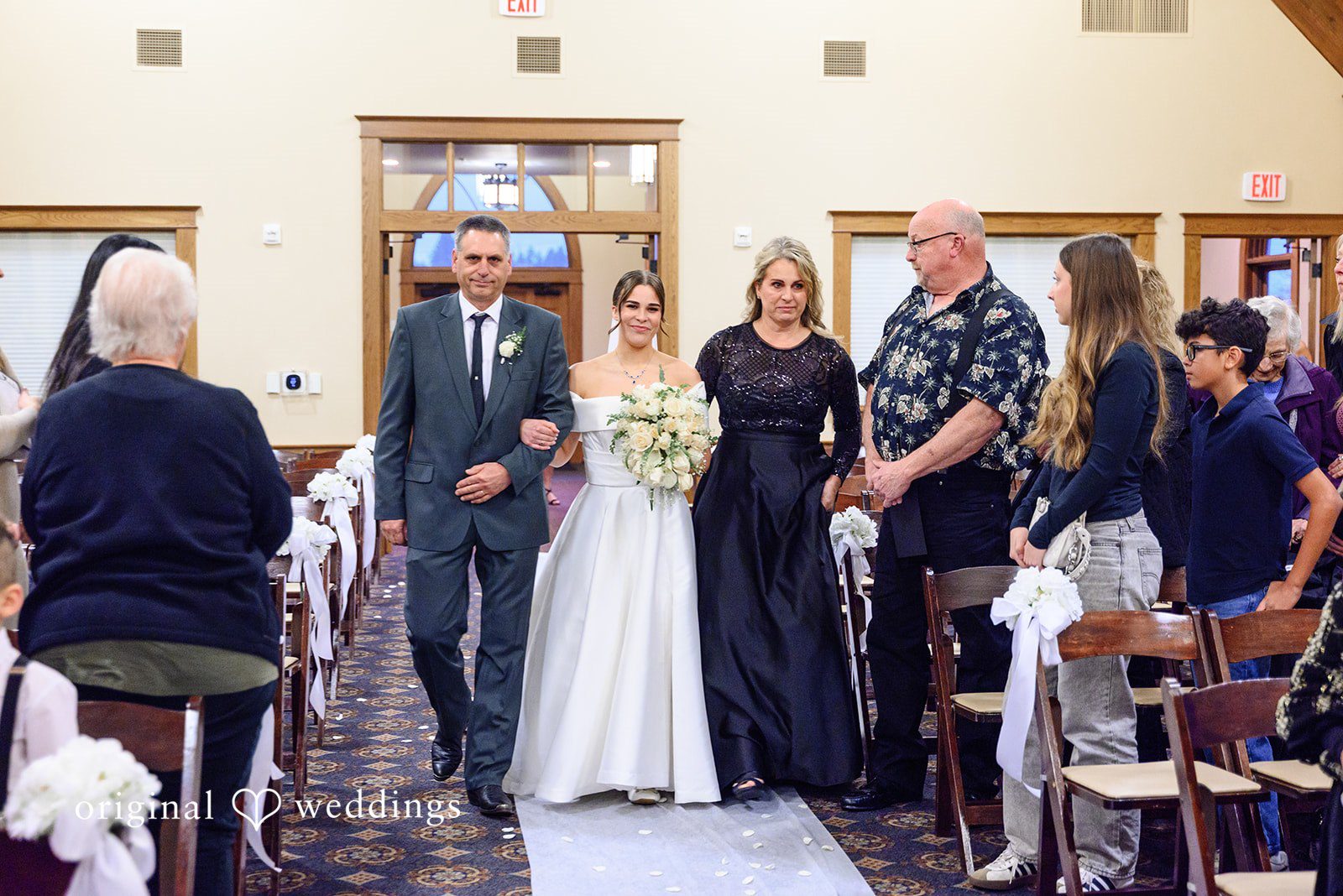 Avery + Ben Bride walking down the aisle