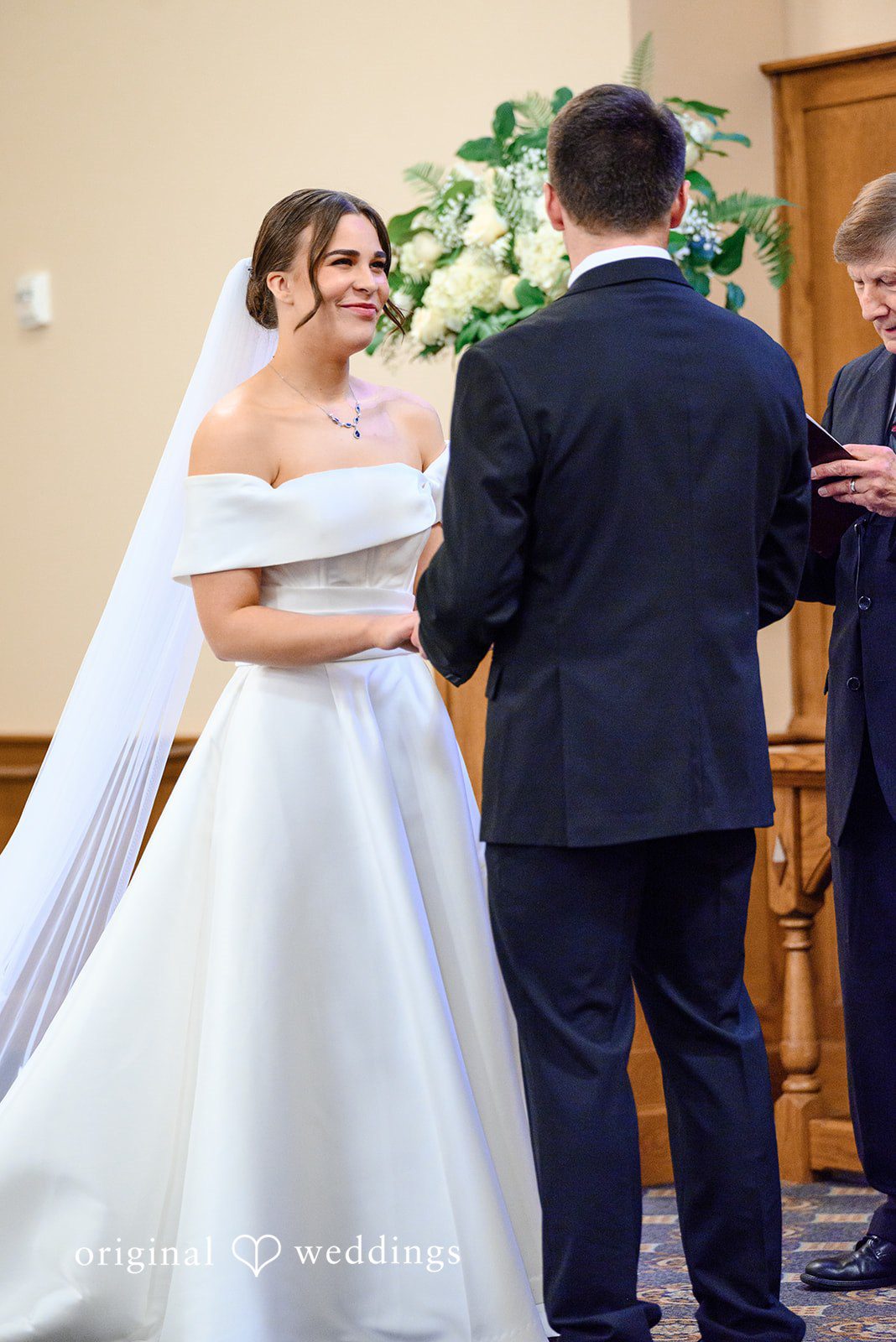Avery + Ben Bride looking at groom, smiling.