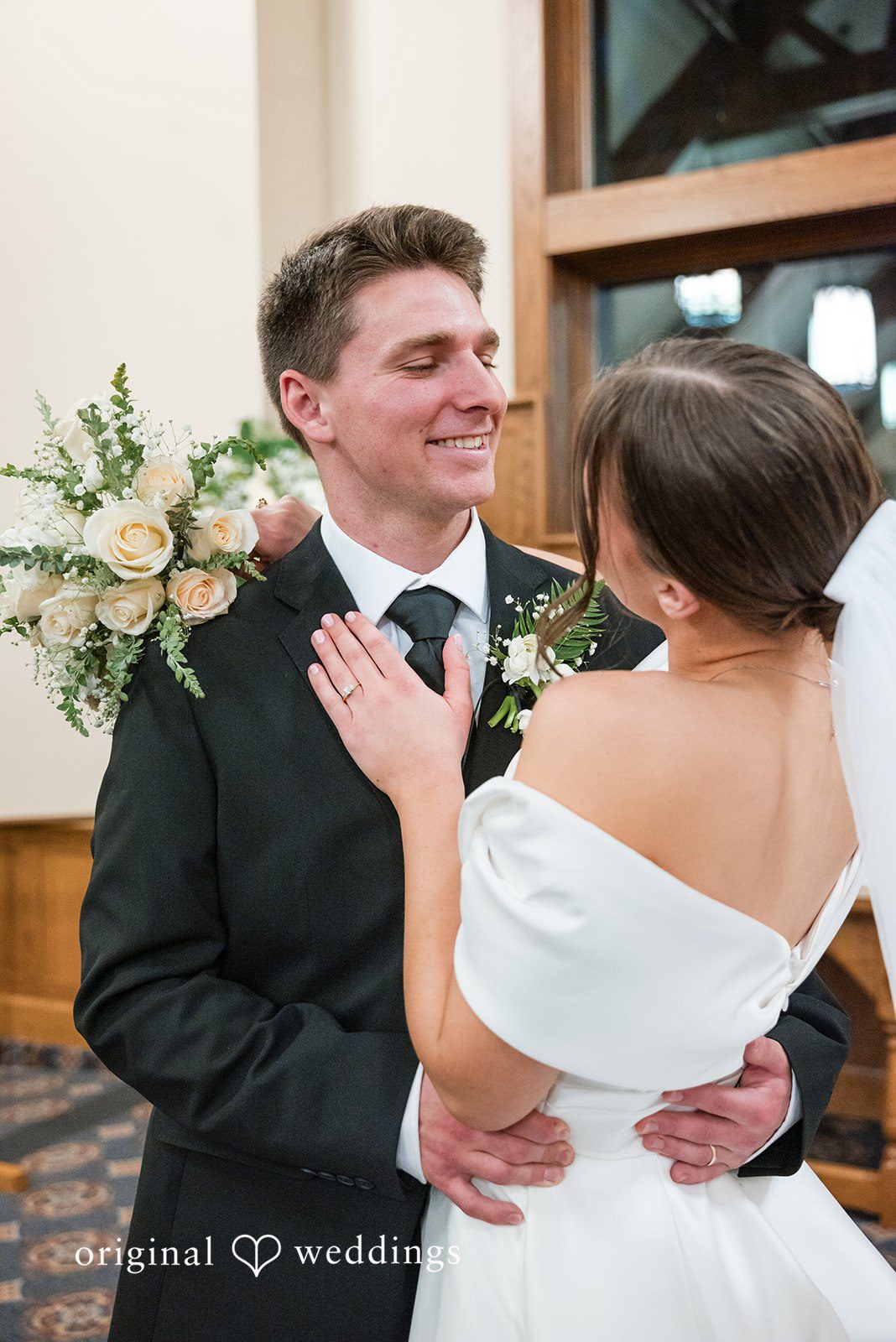 Avery + Ben Lovely dance picture of couple holding bouquets in bride's hand