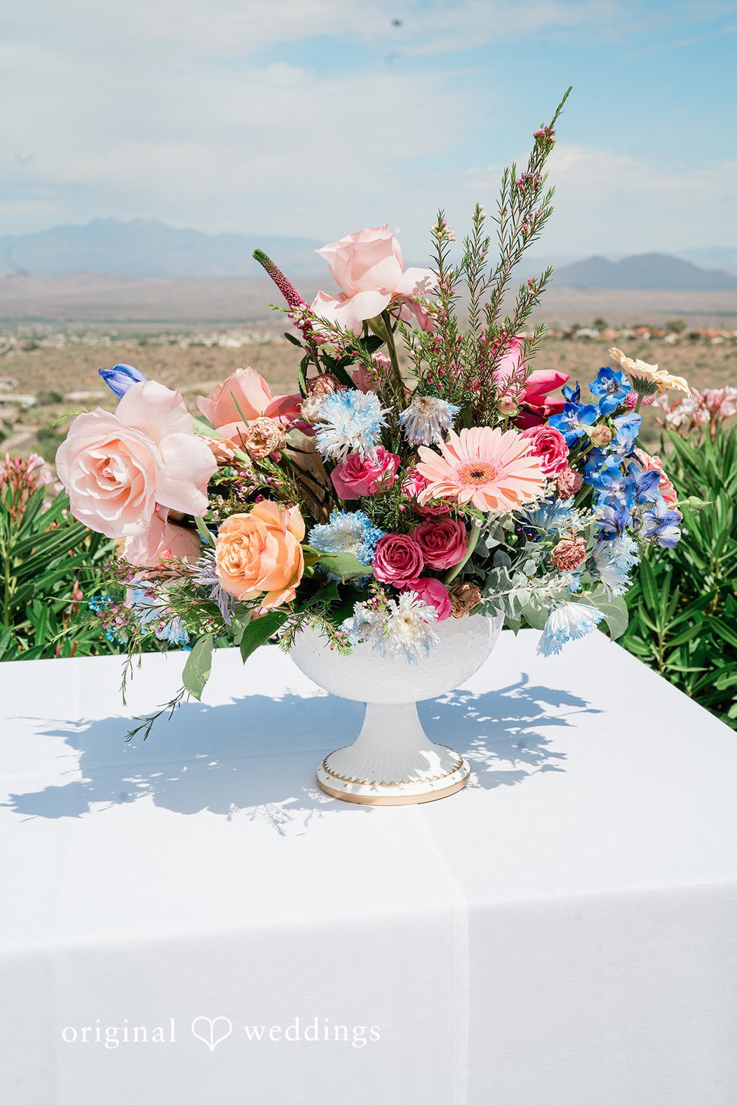 Kathryn + Calum Floral arrangement with soft wedding blooms and greenery