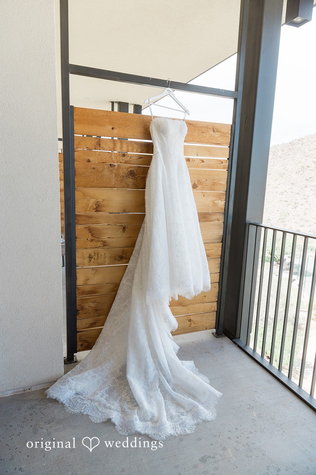 Kathryn + Calum Wedding dress hanging before the ceremony begins