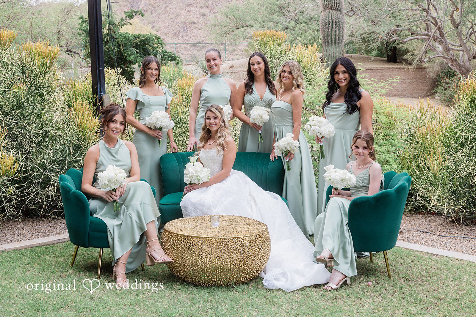 Kathryn + Calum Bride posing with bridesmaids at the wedding venue