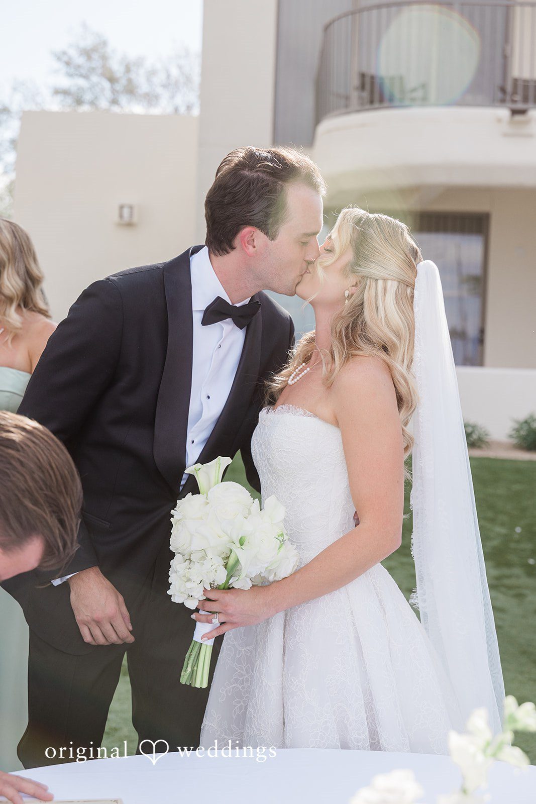 Kathryn + Calum First kiss as newlyweds during the outdoor wedding ceremony