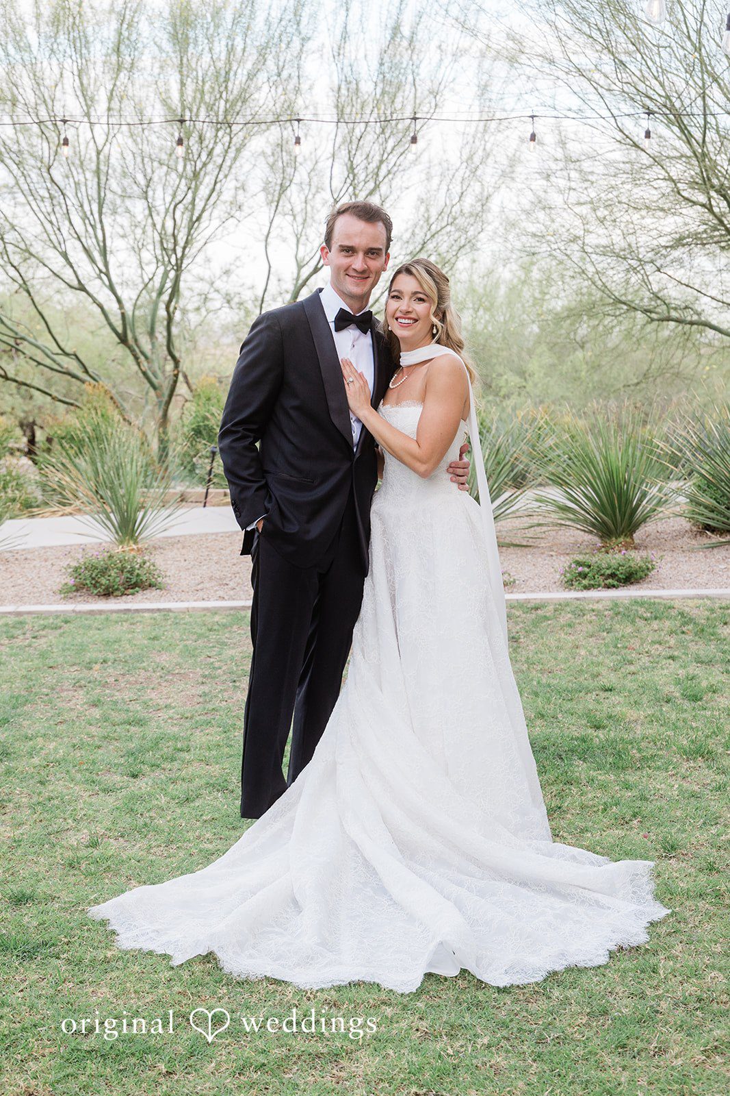 Kathryn + Calum Couple portrait surrounded by greenery at the venue