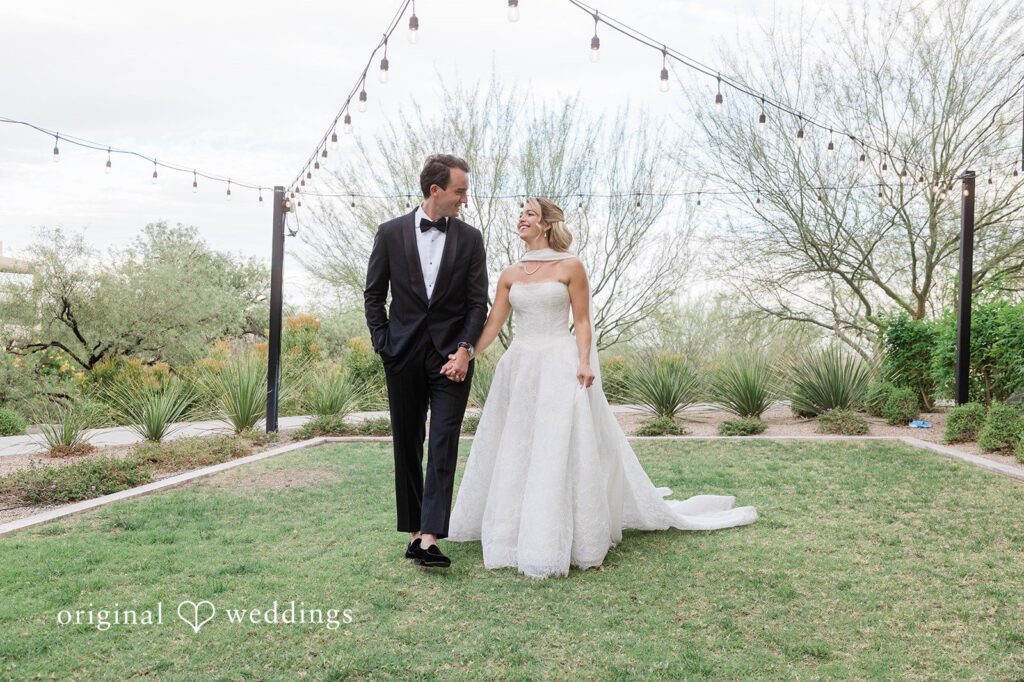 Kathryn + Calum Bride and groom smiling at each other during wedding portraits