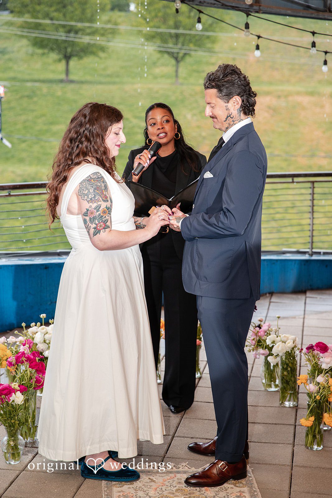 Leah + Daniel Couple embracing and kissing after the wedding ceremony