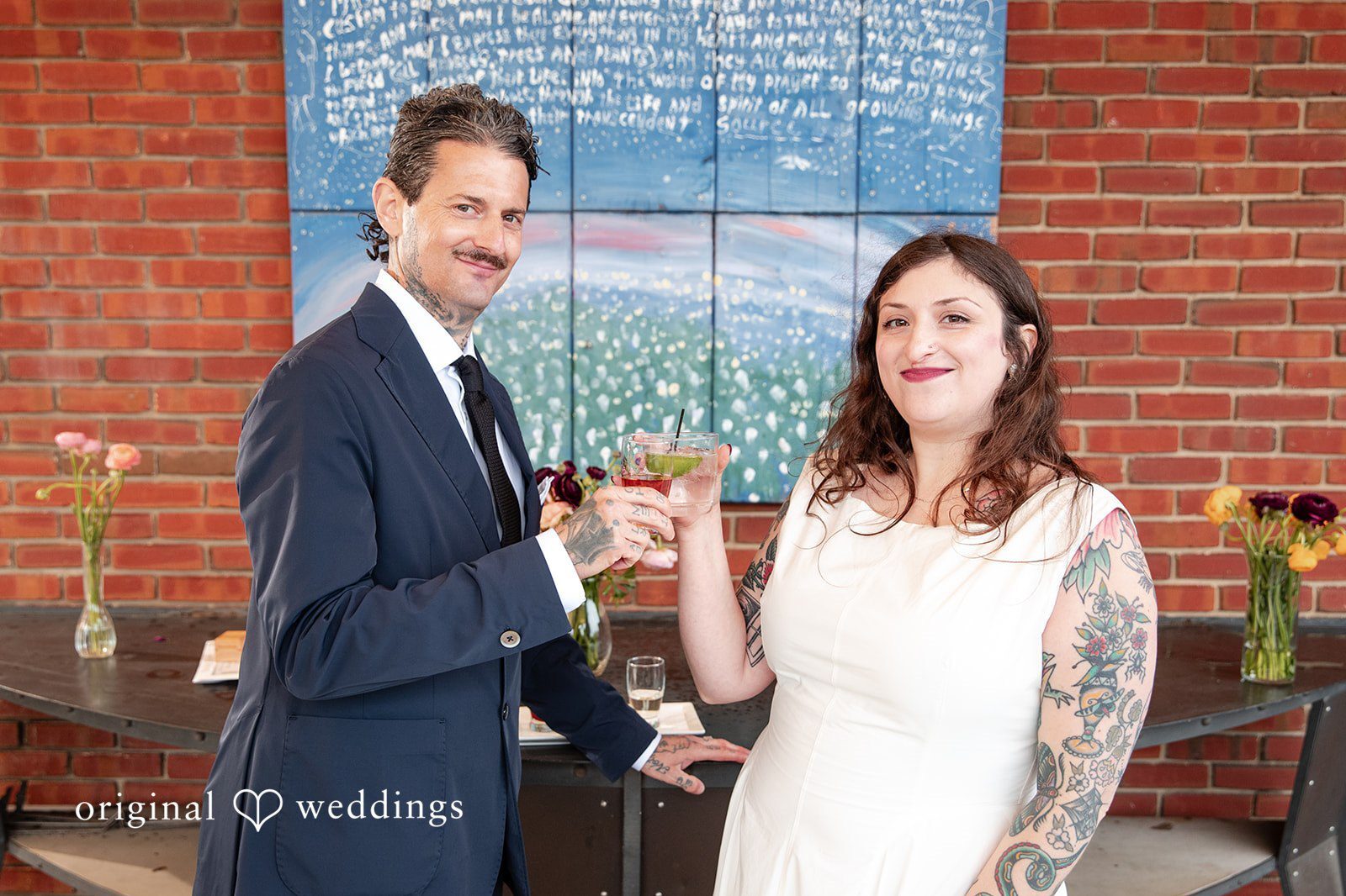 Original Weddings couple portrait captured by Baltimore Wedding Photographers at American Visionary Art Museum during a romantic wedding