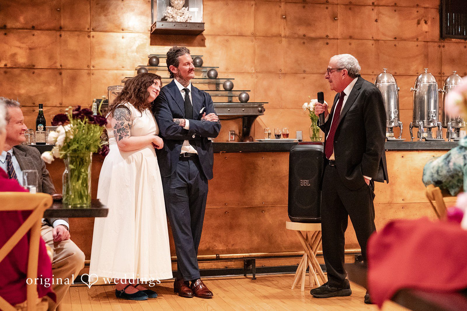Leah + Daniel Bride and groom celebrating together during the reception party