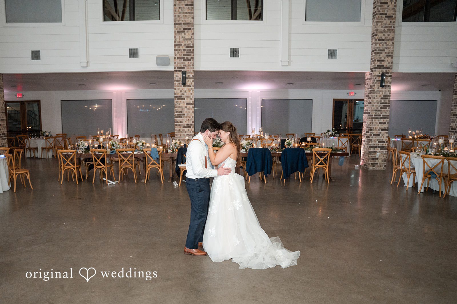 Kennedy + Collin The couple shares a romantic moment at the wedding reception hall