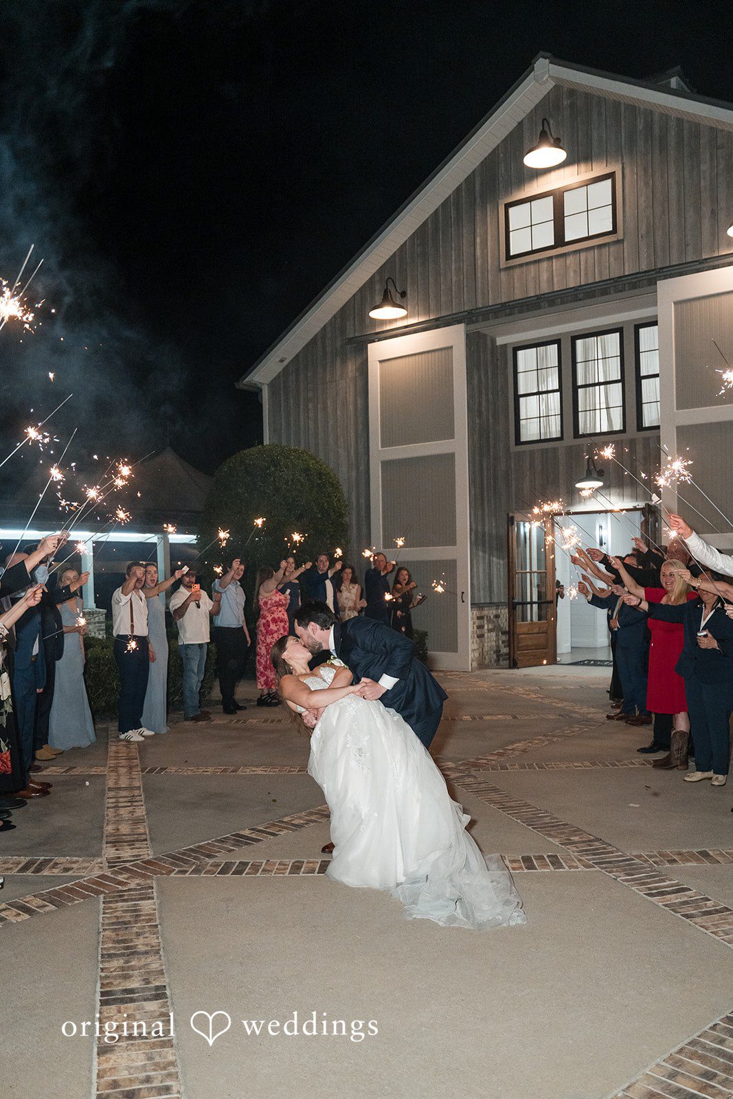 Kennedy + Collin The couple makes a grand exit with cheers from guests
