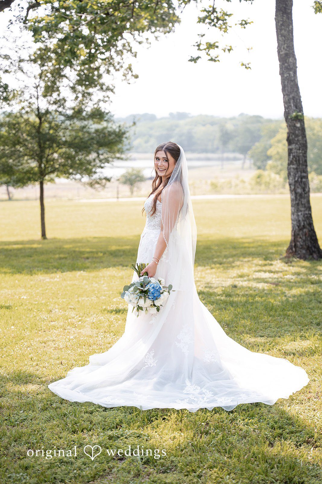 Kennedy + Collin A stunning portrait of the bride at Arrowhead Hill at Lakota