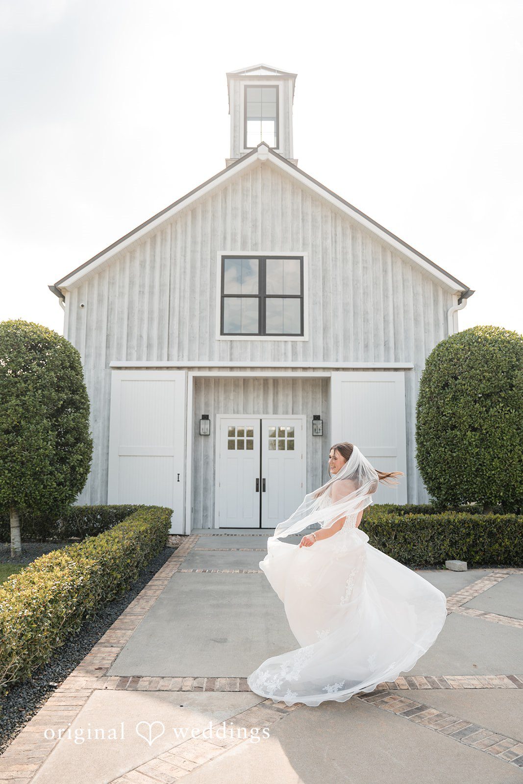 Kennedy + Collin A beautiful portrait of the bride exposing the beauty of the wedding venue