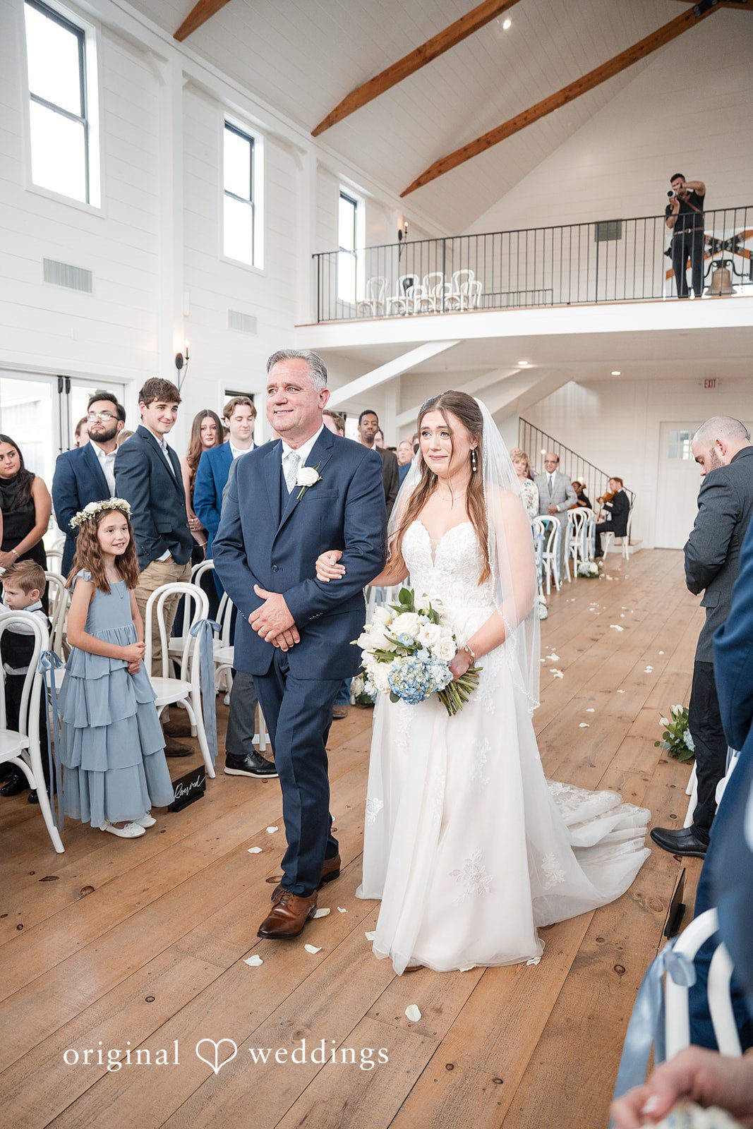 Kennedy + Collin The bride's father escorts the bride down the aisle