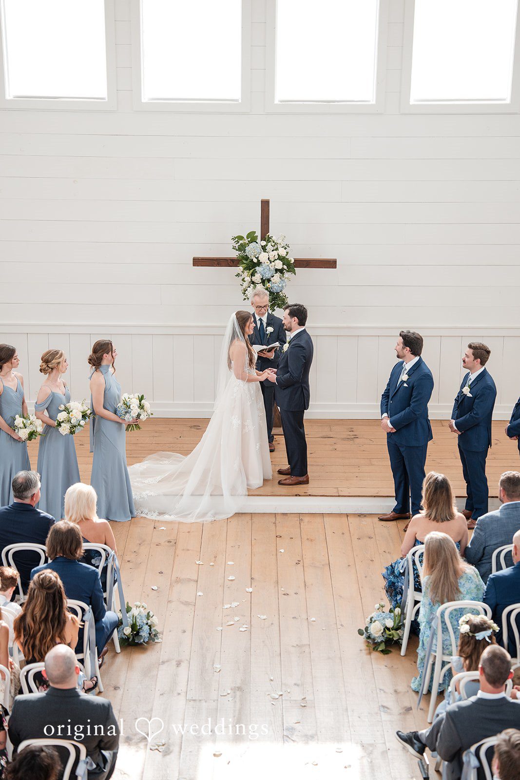 Kennedy + Collin The bride and groom at their wedding ceremony