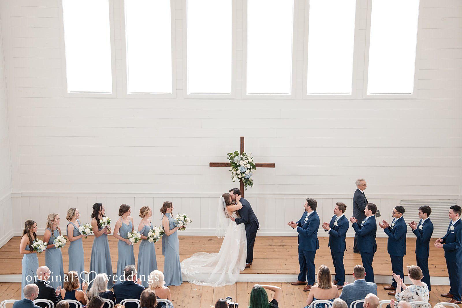 Kennedy + Collin The couple seals their union with a kiss