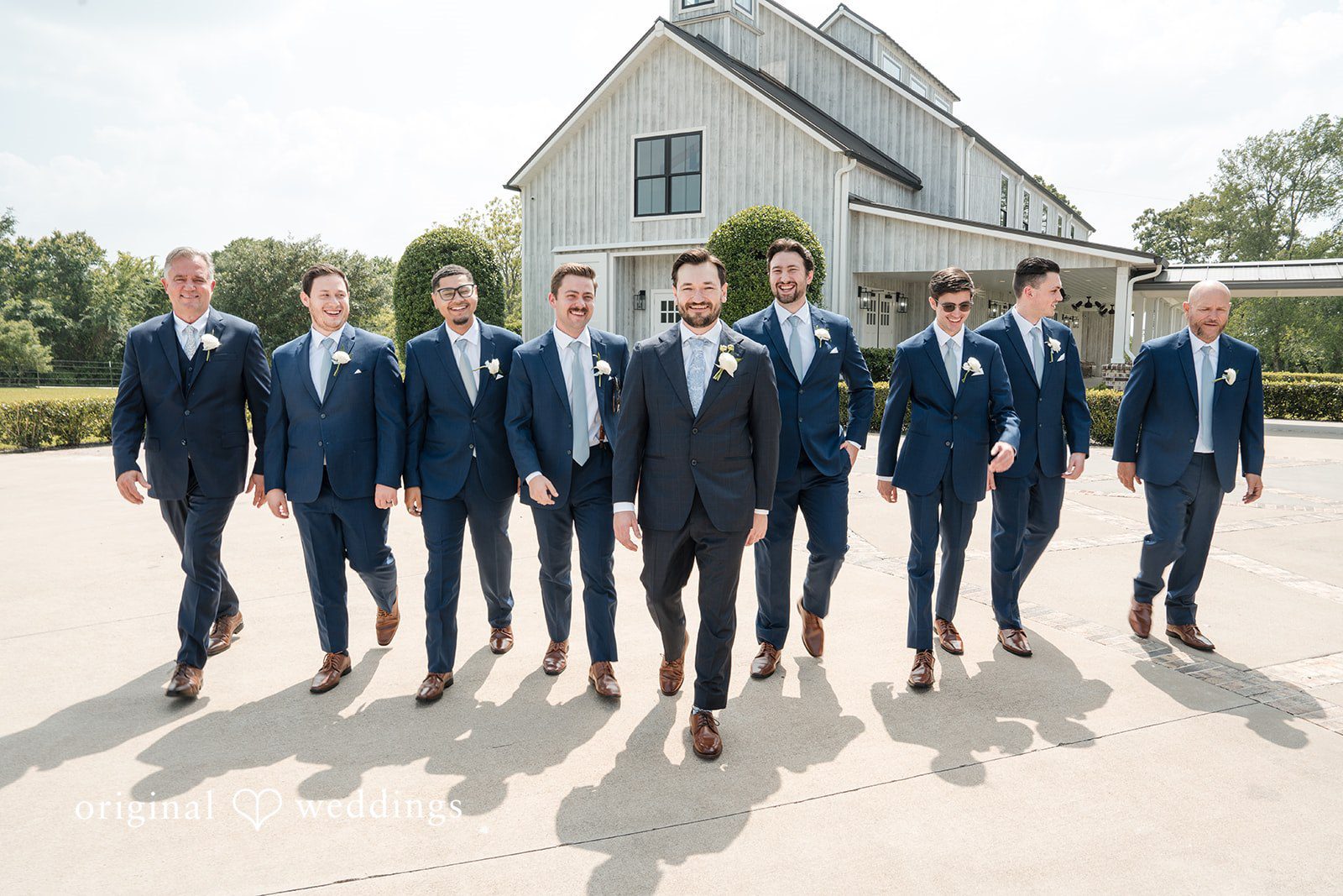 Kennedy + Collin A portrait of the groom with his groomsmen