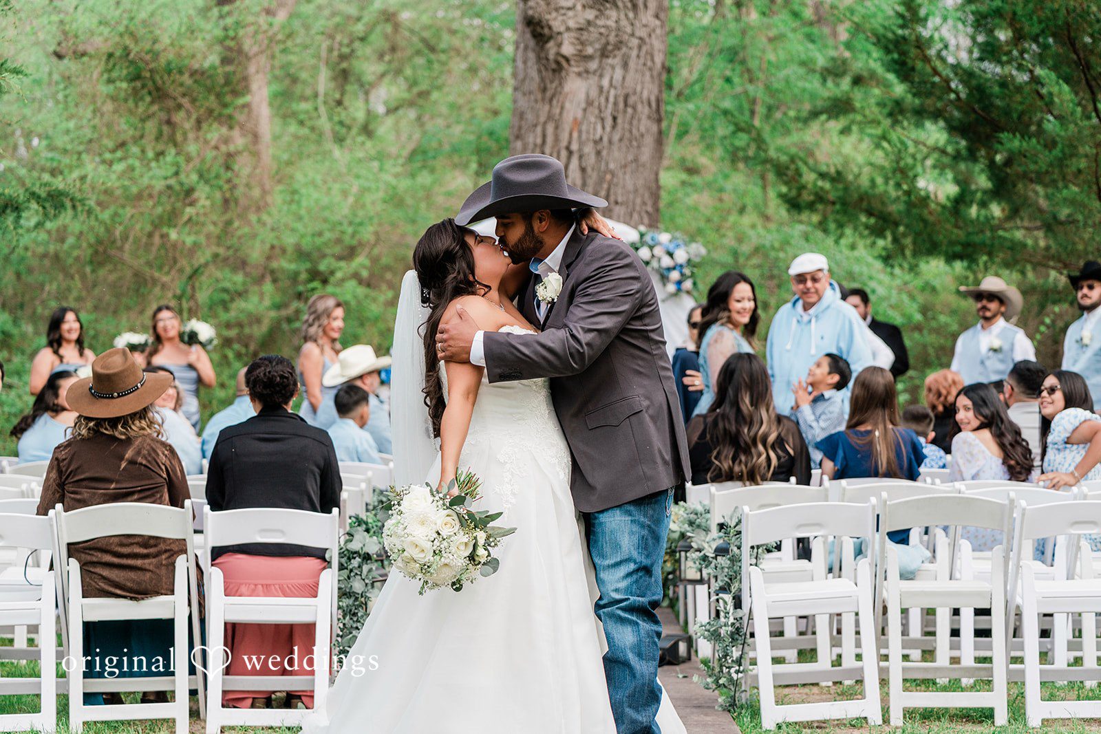 The couple shares a kiss