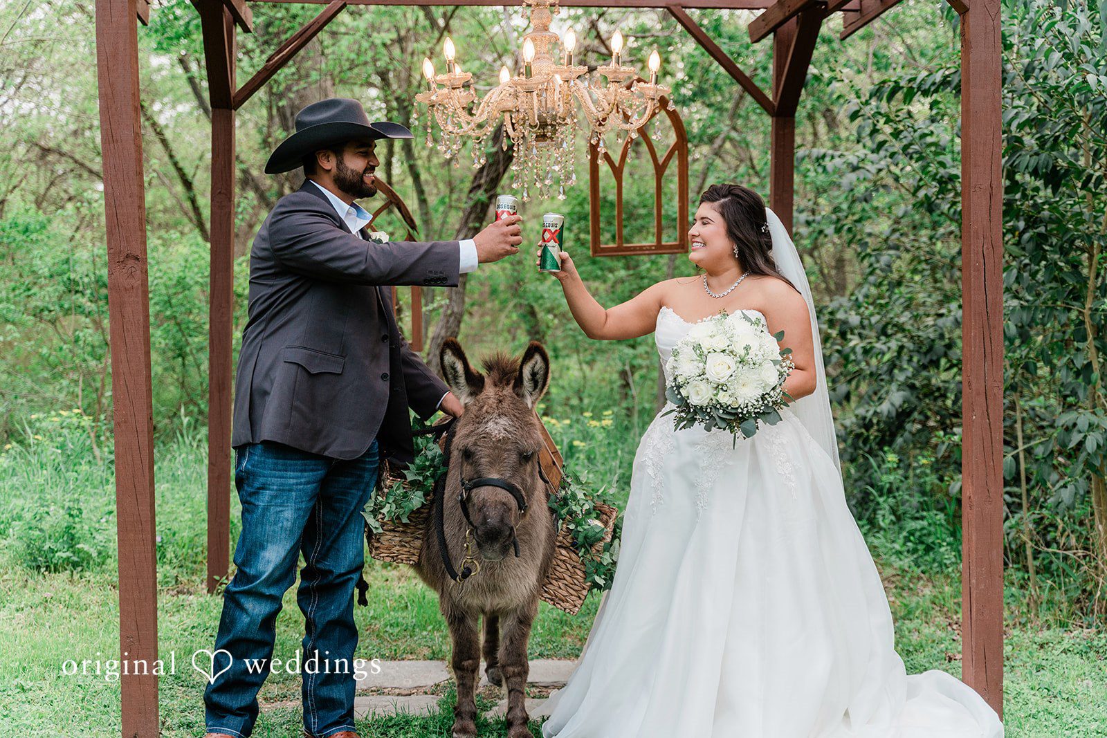 Our Dallas wedding photographers captured a joyful portrait of the couple with their pup at Arrowwood Events