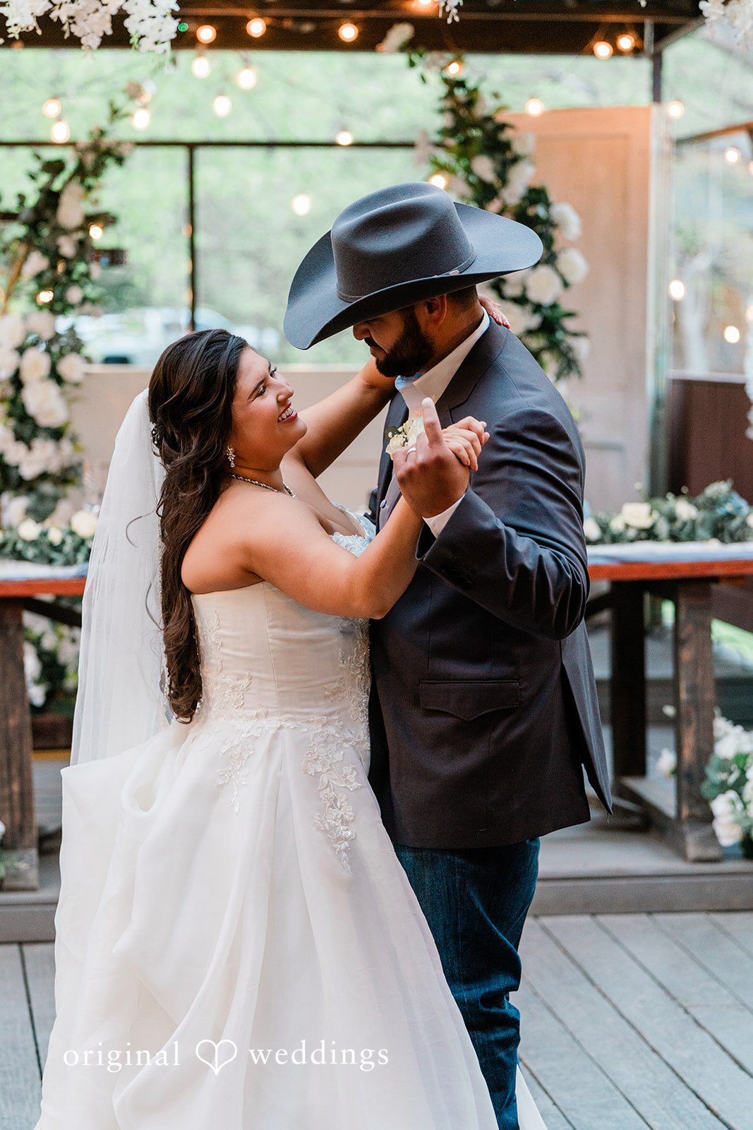 The couple dances at their wedding reception