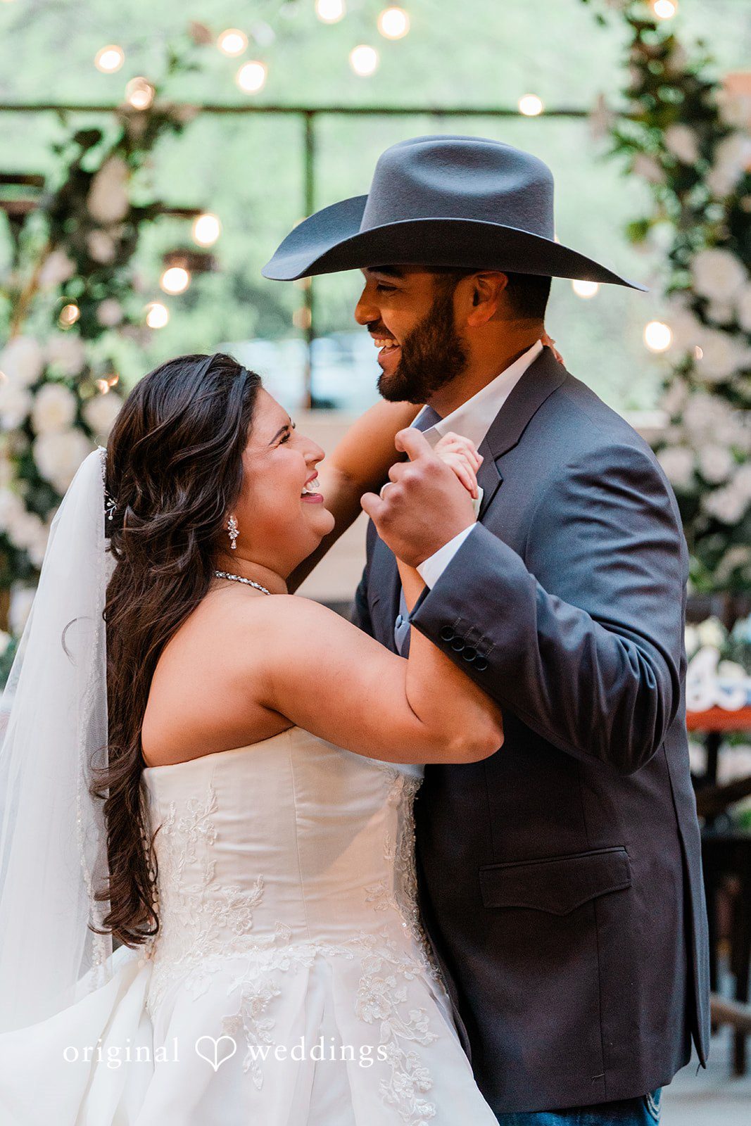 Our Dallas wedding photographers captured the couple dancing happily