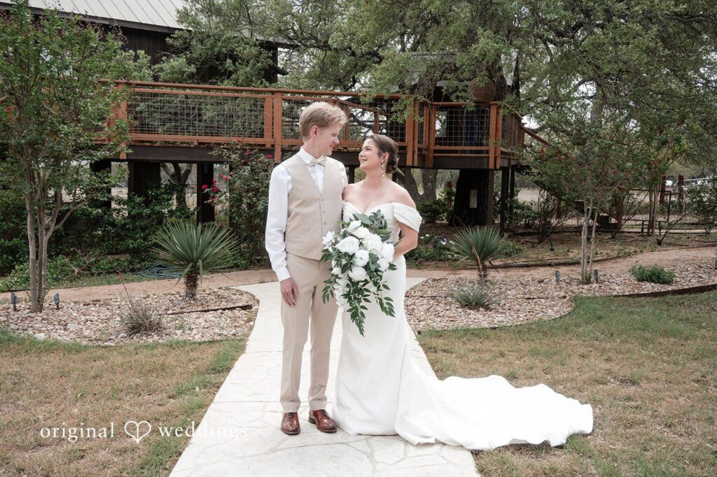 Hannah + Will Austin Wedding Photographers capturing Hannah & Will’s romantic outdoor couple portrait at Asante Lodging Wedding venue, Original Weddings