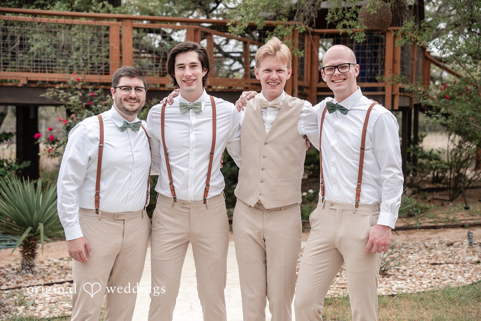 Hannah + Will Groom with groomsmen in a celebratory wedding party shot