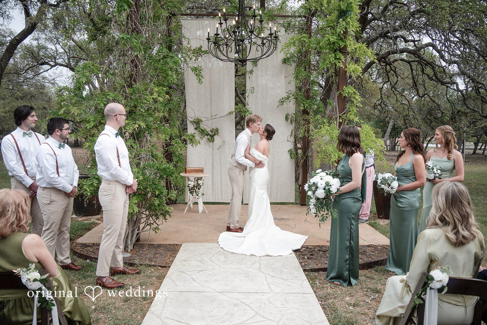 Hannah + Will Wedding kiss after the ceremony vows