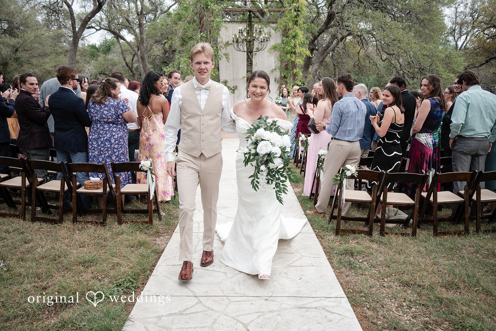 Hannah + Will Couple walking out of the ceremony space together