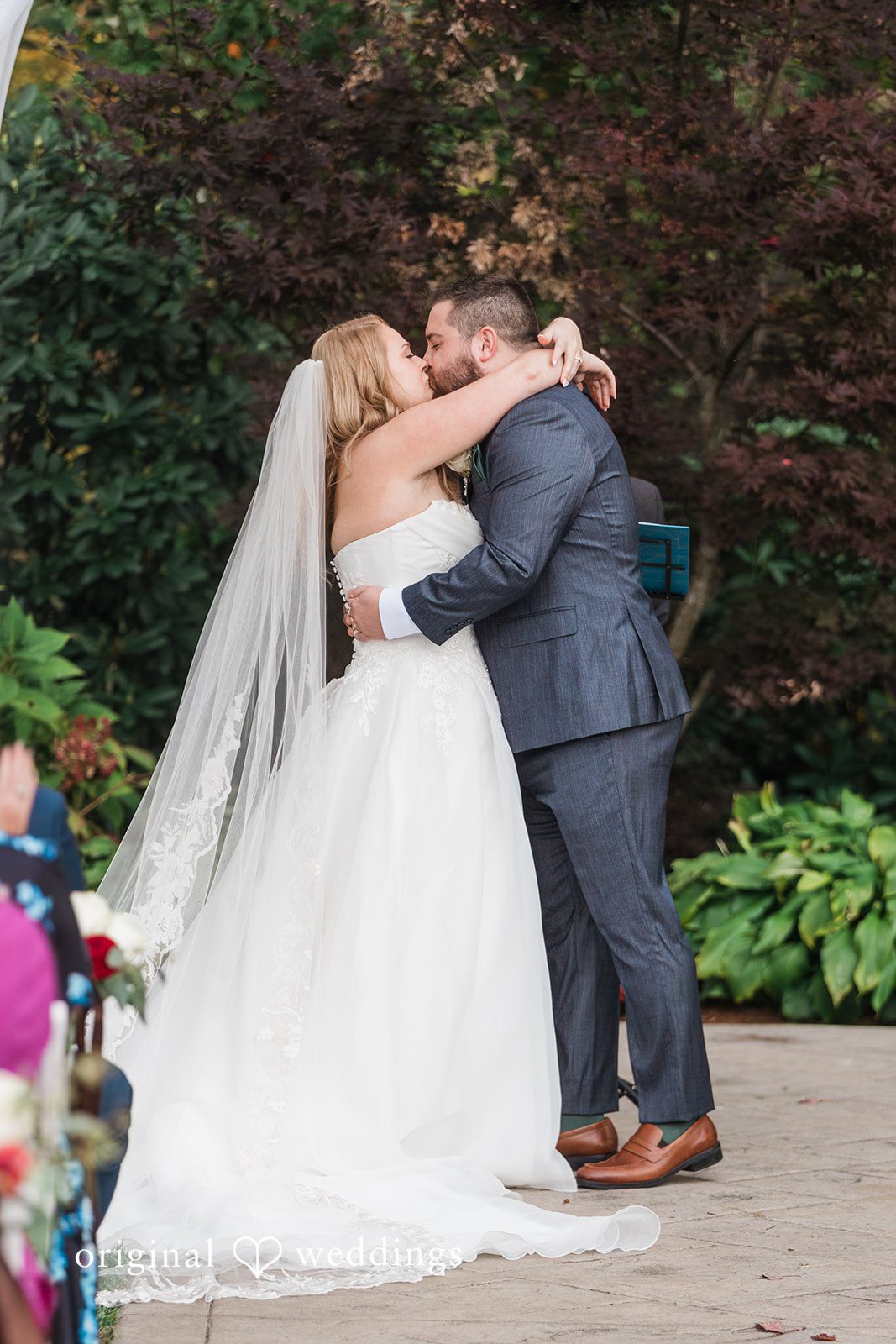 Shayna + Joseph The couple seals their union with a kiss