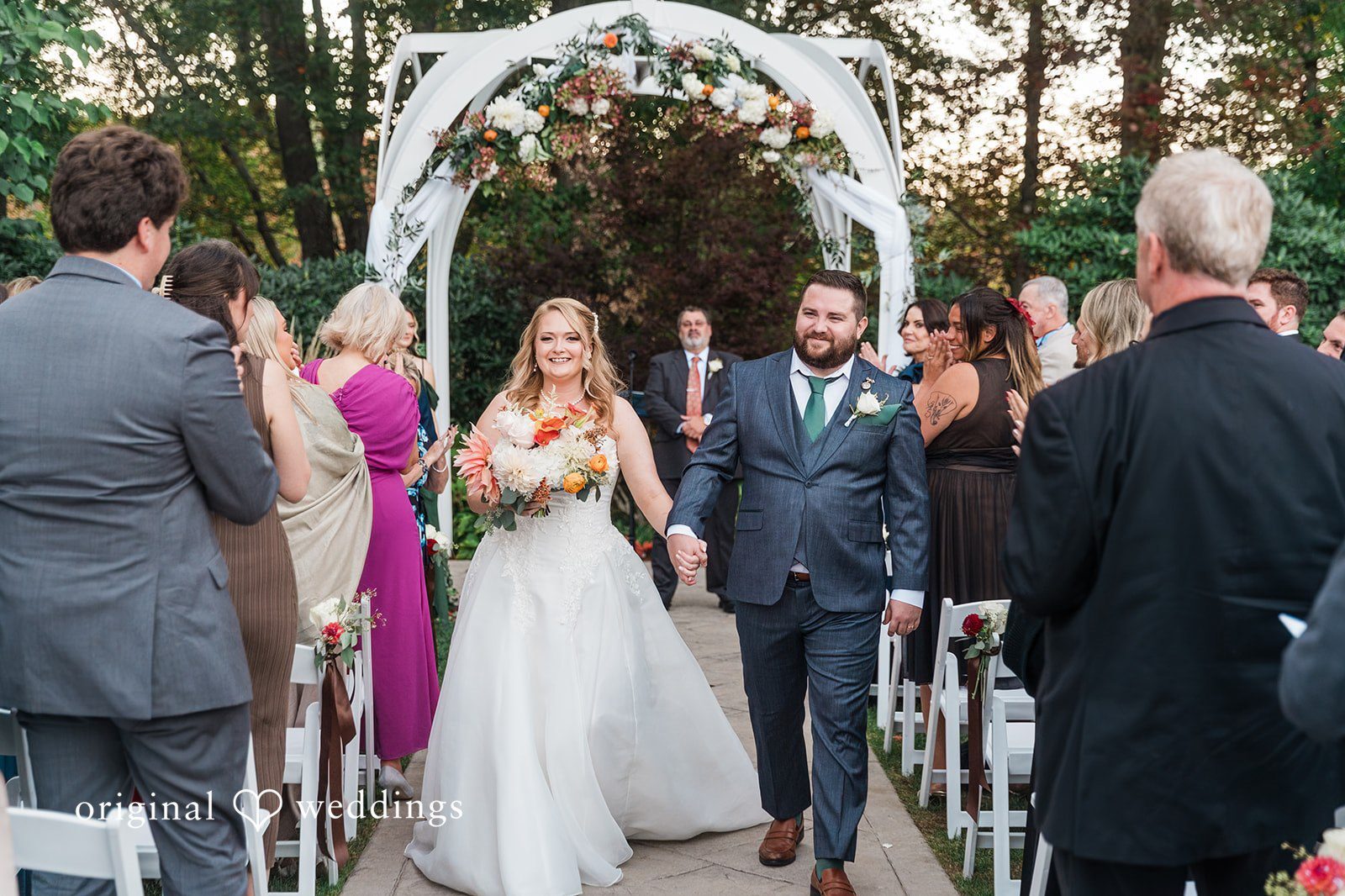 Our Boston wedding photographer at Original Weddings captured the couple’s joyful exit after their Avenir wedding ceremony