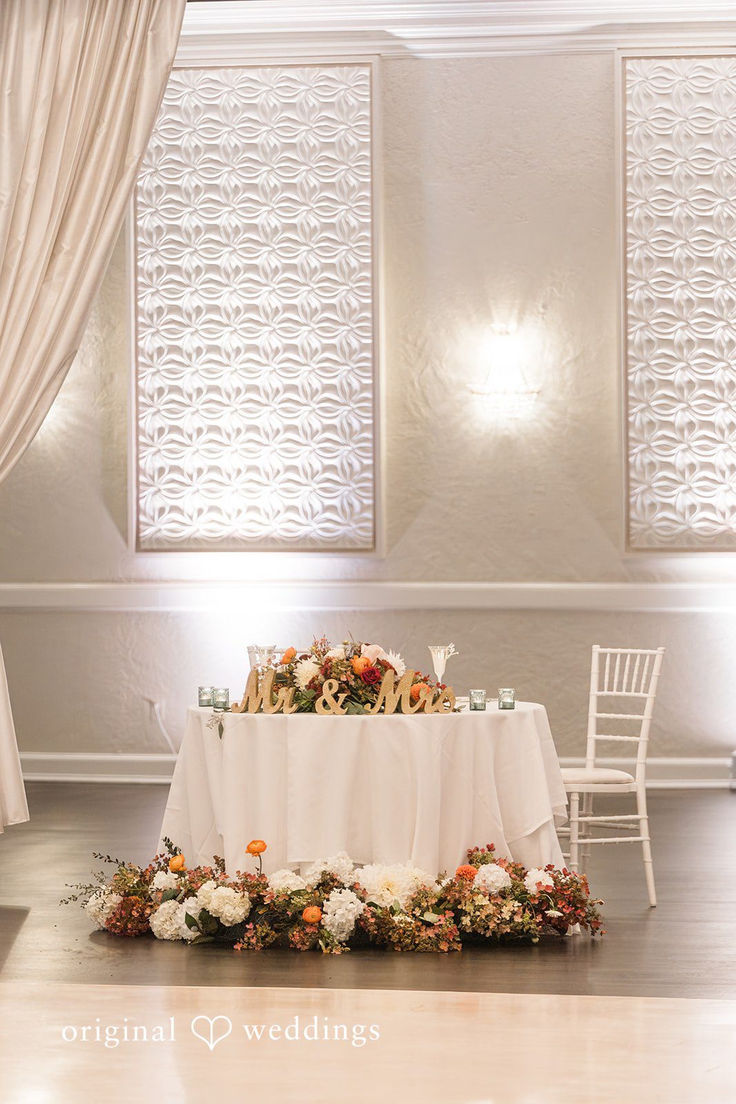Shayna + Joseph Table decorated with huge florals at the Avenir reception hall