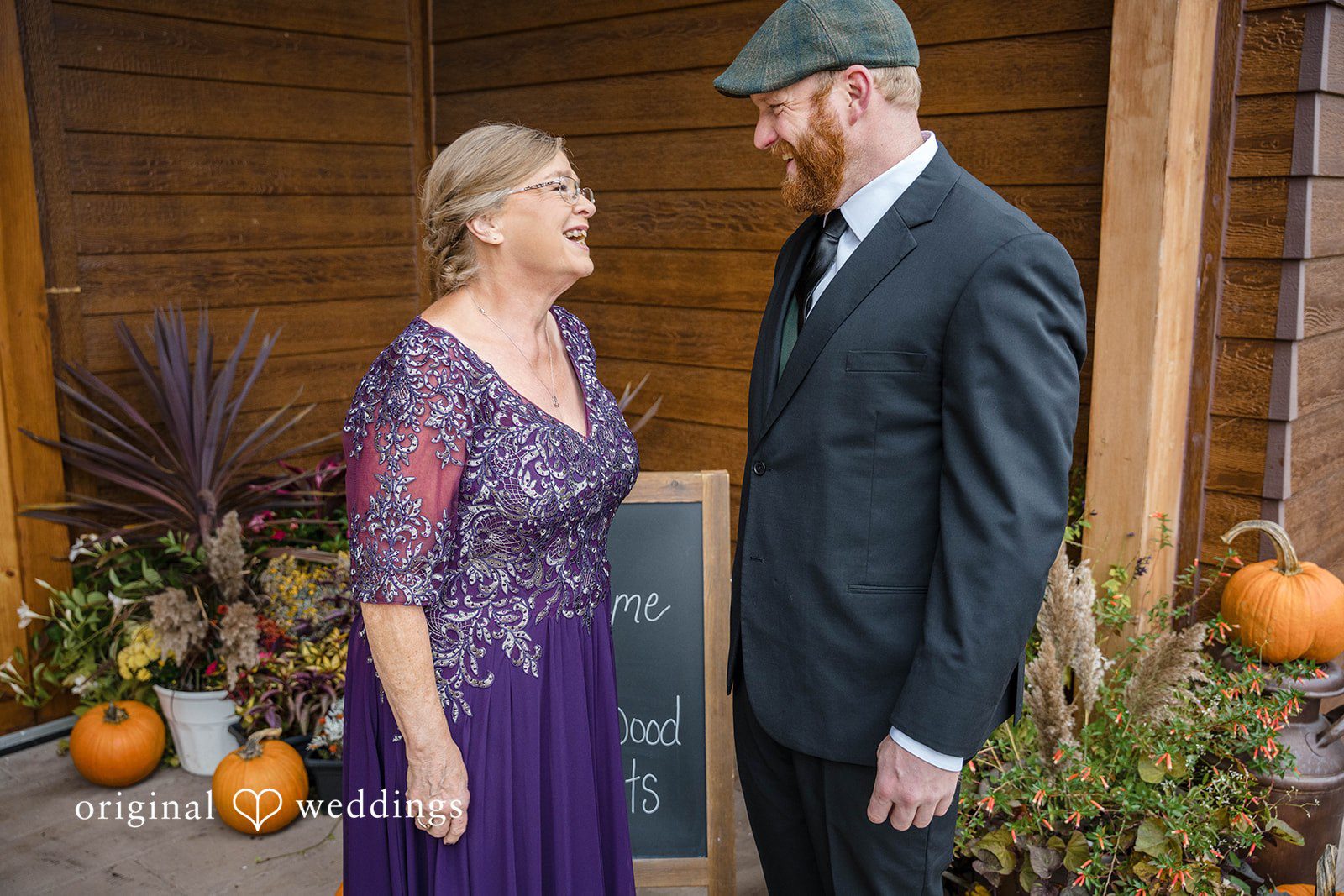 William + Alicia Elegant candid moment of groom with a lady at Barnwood Events