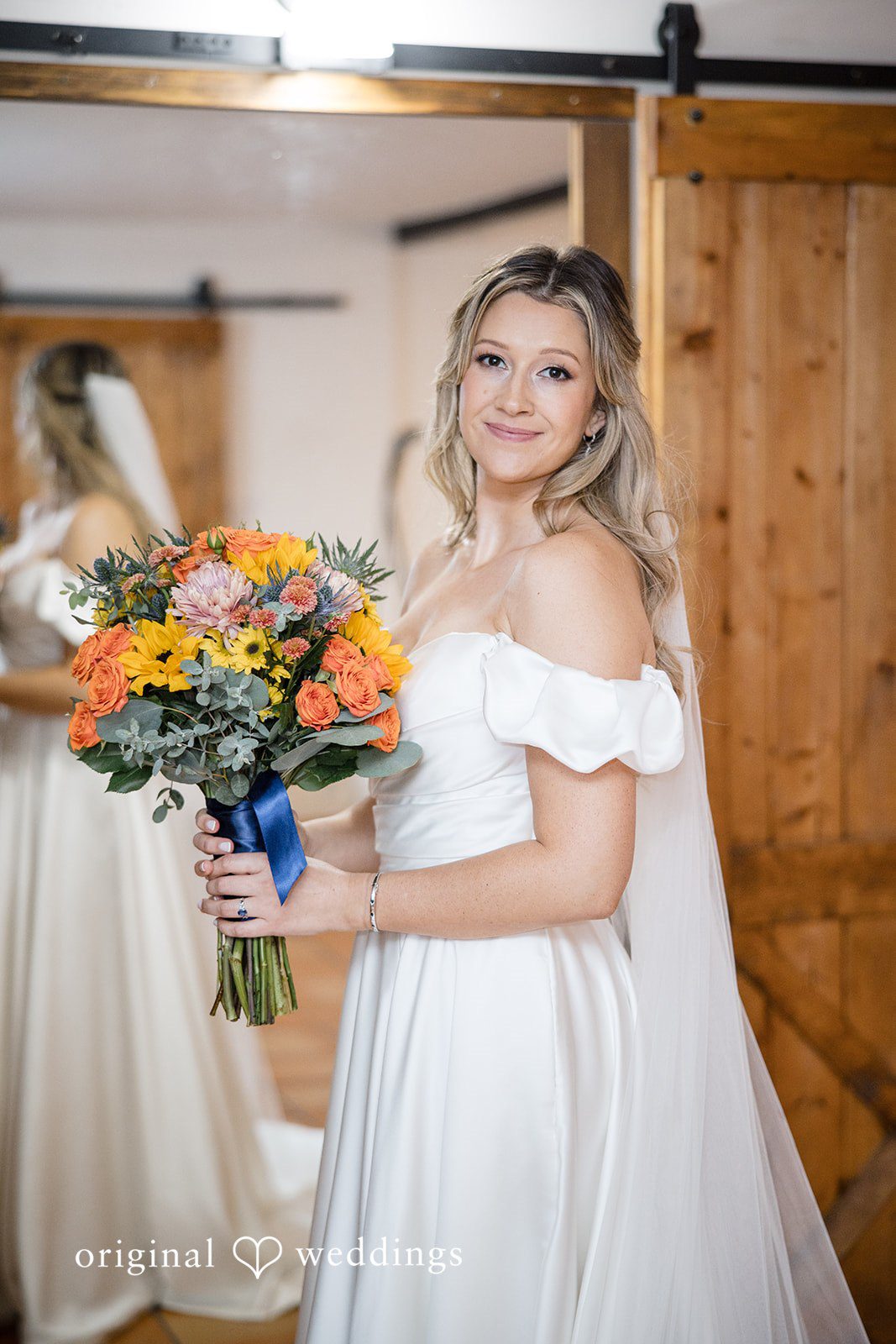 Olivia + Connor Bride posing after wedding preparations in natural light