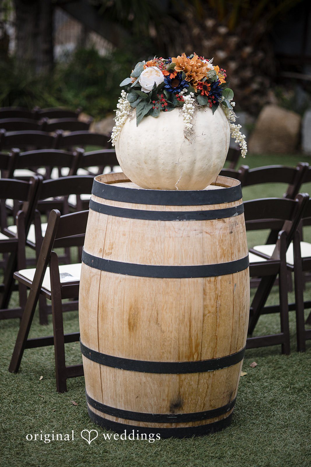Olivia + Connor Close-up of ceremony decor and floral styling at the venue