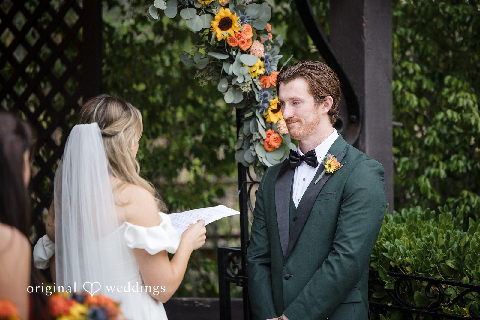 Olivia + Connor Bride reading her vows to the groom during the ceremony