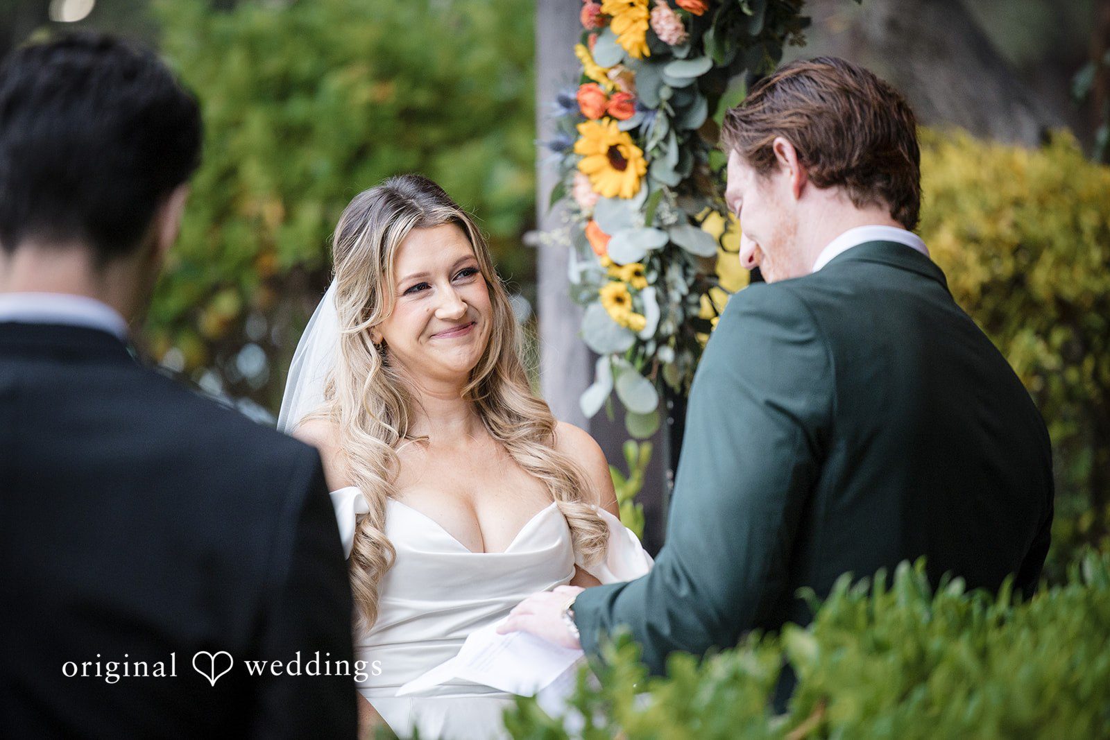 Olivia + Connor Bride and groom exchanging vows during the wedding ceremony
