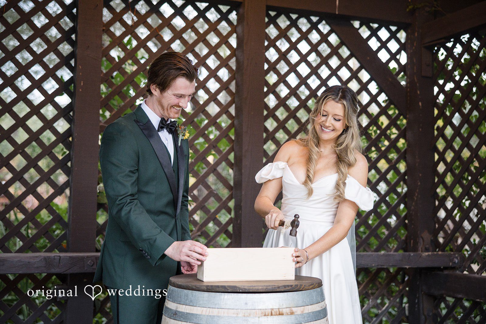 Olivia + Connor Bride and groom opening a special item together during the ceremony