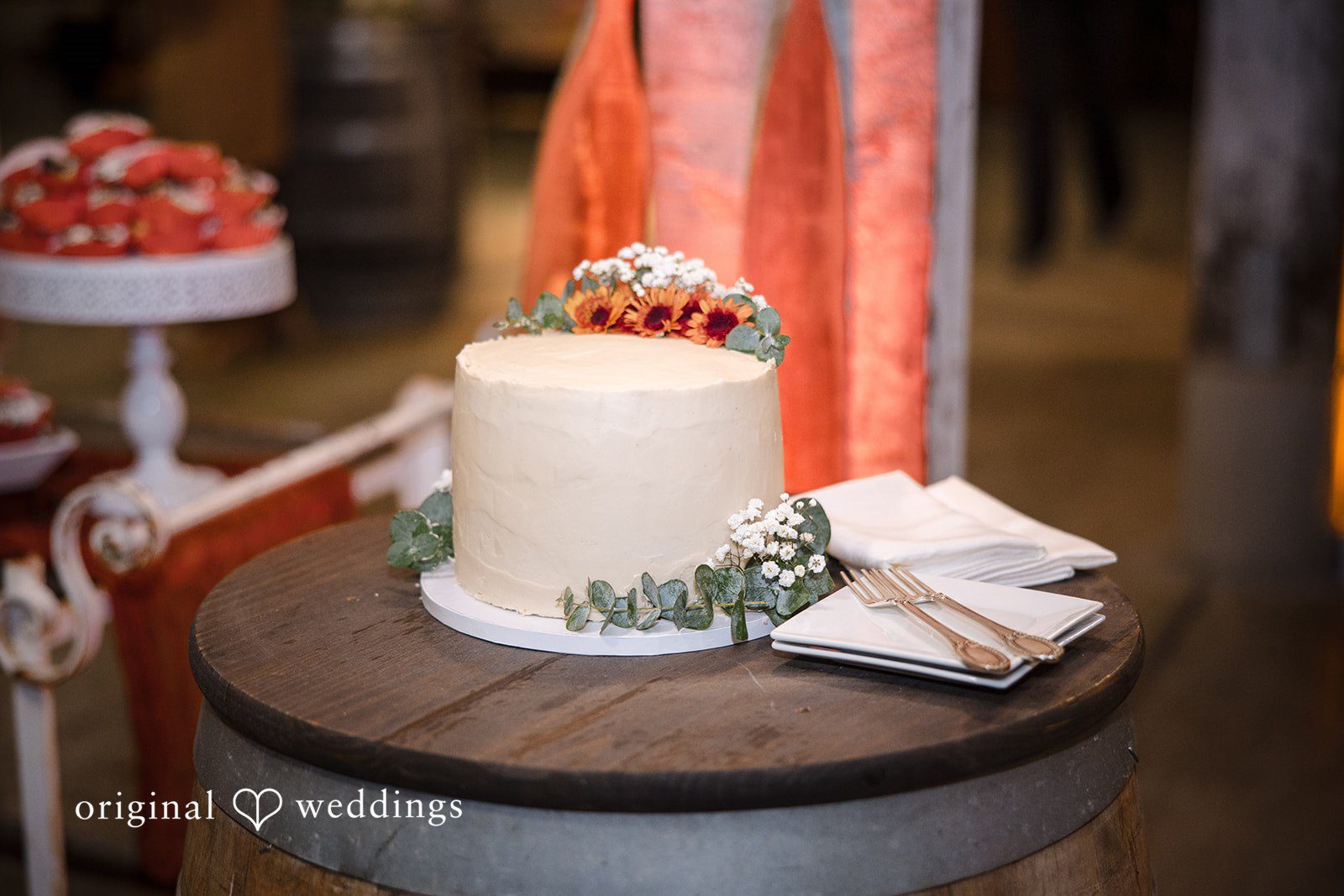 Olivia + Connor Elegant wedding cake with detailed floral decorations