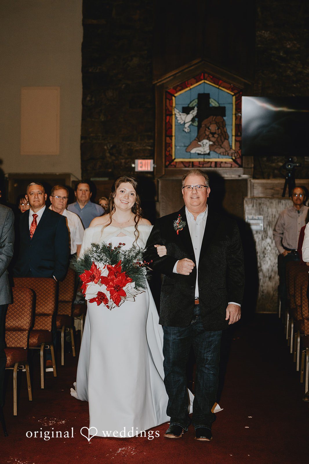 Beautiful bride carrying festive bouquet while entering wedding ceremony