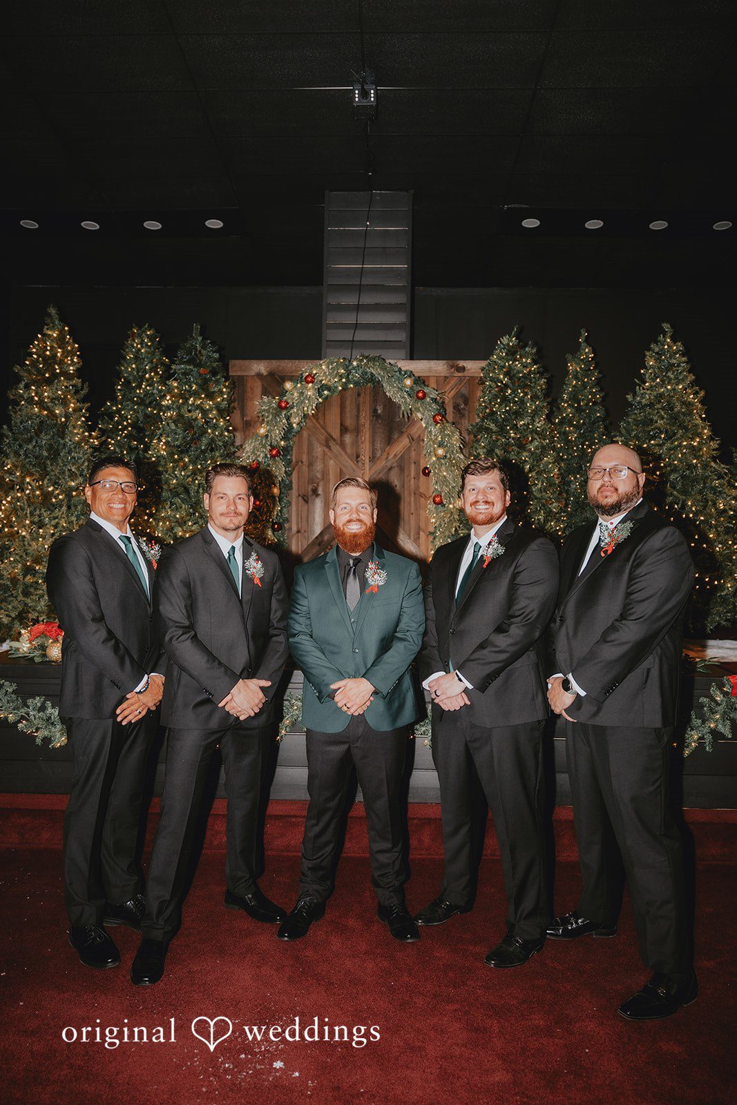 Groomsmen posing together at Bethel Baptist Church wedding ceremony