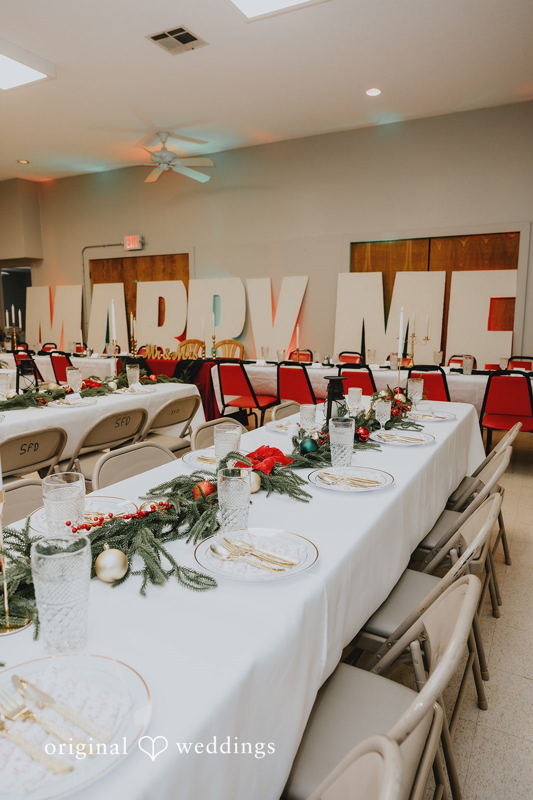 Elegant wedding reception table setup at Bethel Baptist Church with Christmas themed decor
