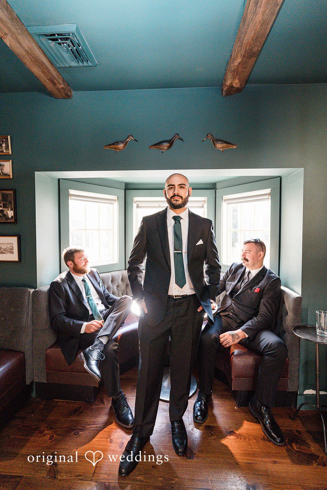 Stunning portrait of groom with groomsmen.