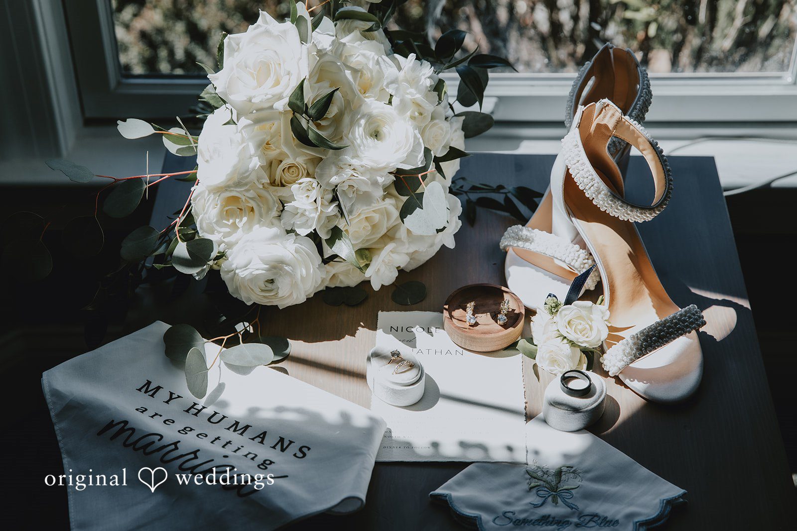 Bridal accessories and bouquet detail styled in natural light