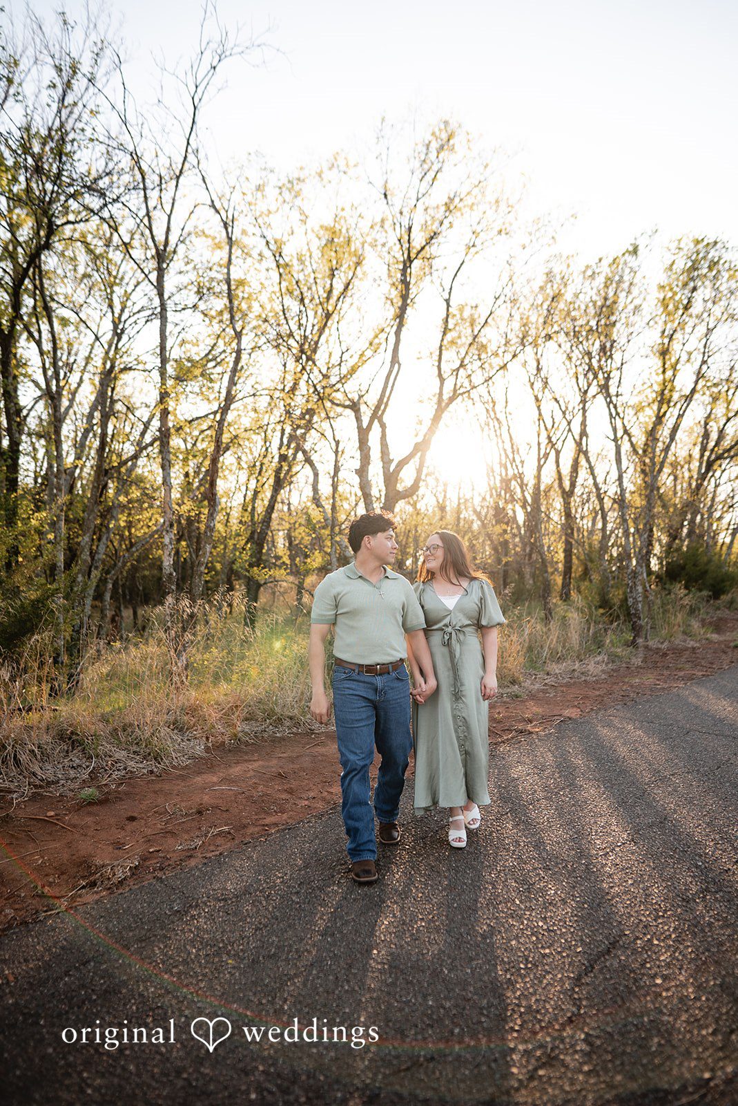 The couple takes a walk at Bluff Creek Park
