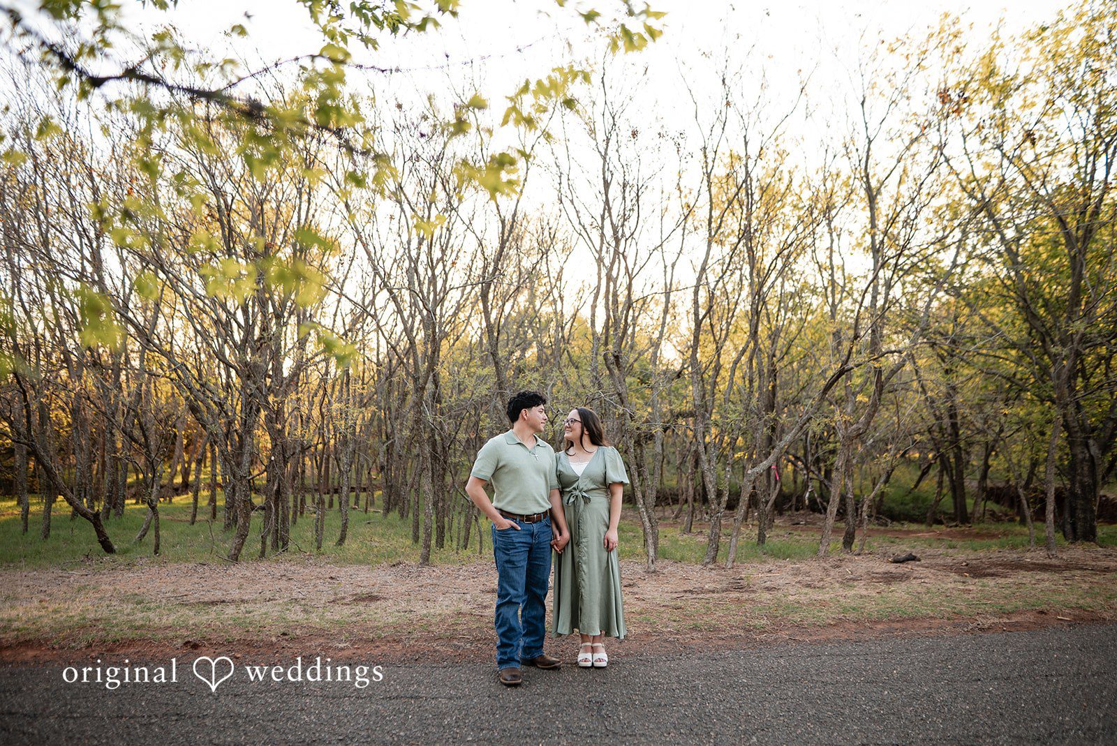 A portrait of the couple at Bluff Creek Park