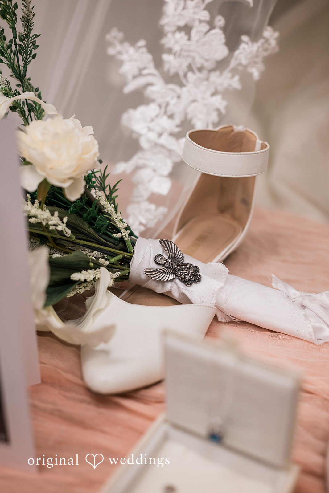 Stylish bridal accessories featuring sandals at Blumen Gardens