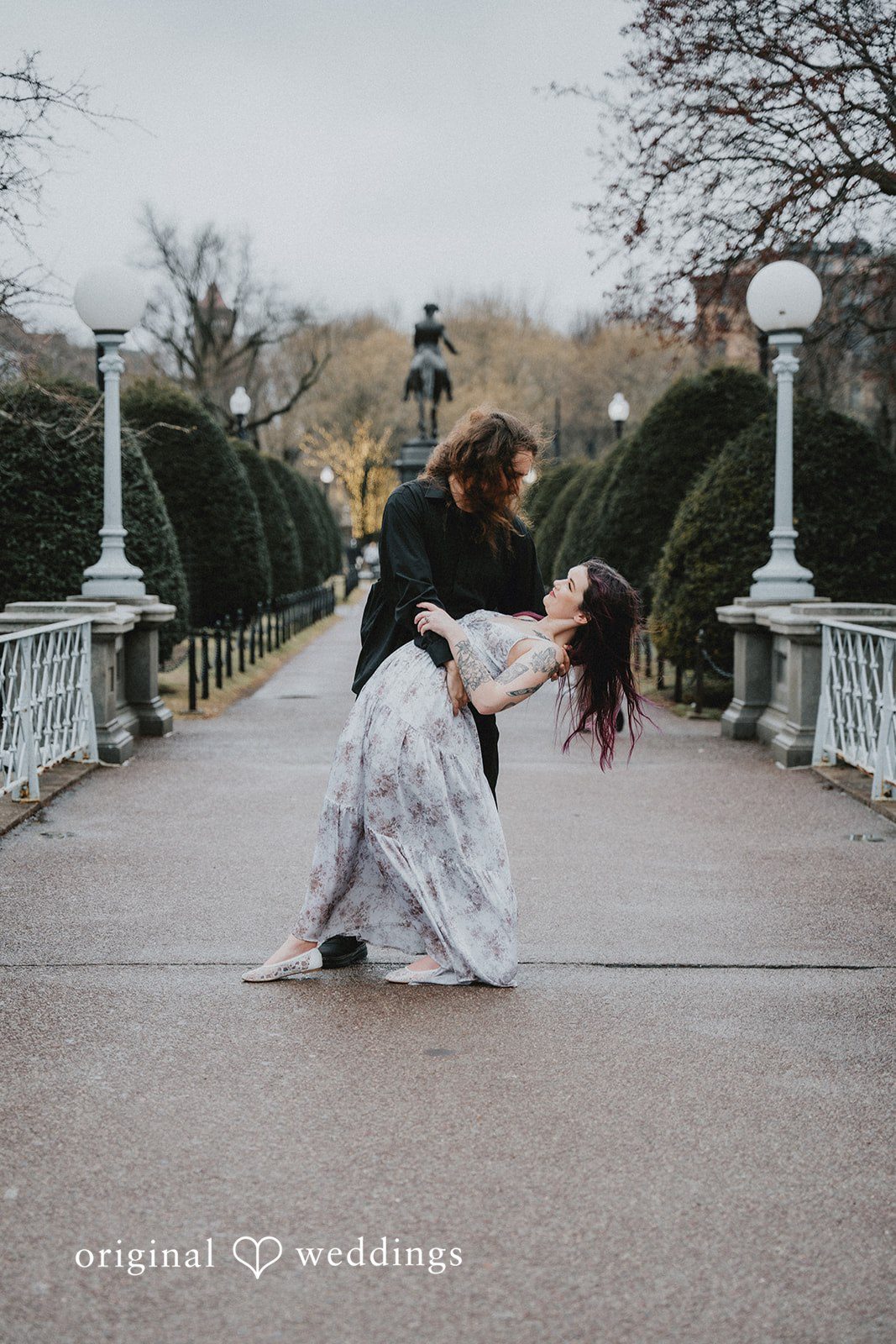 Romantic pose of couple at Boston Public Garden