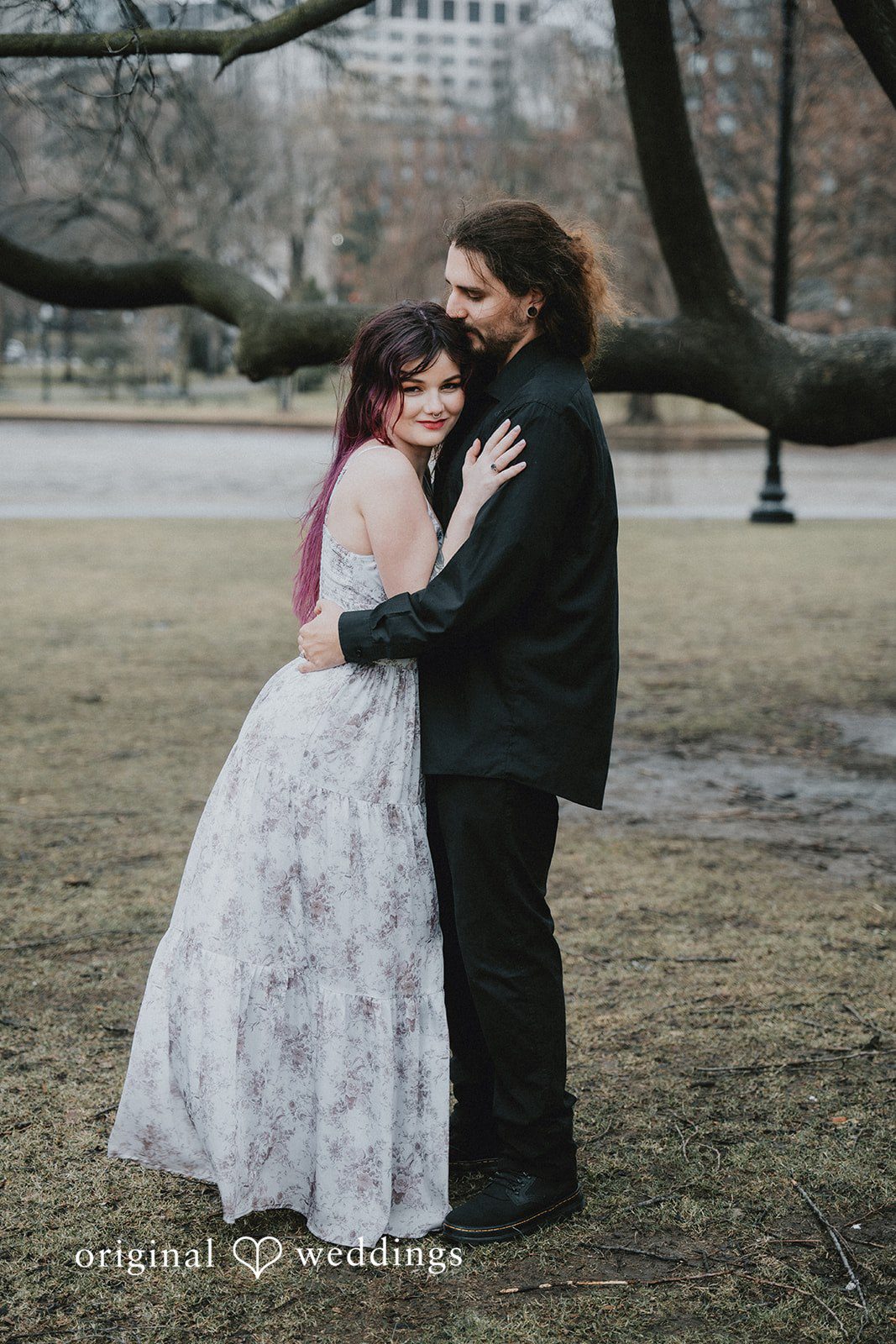 Couple sharing their love during photo session at Boston Public Garden