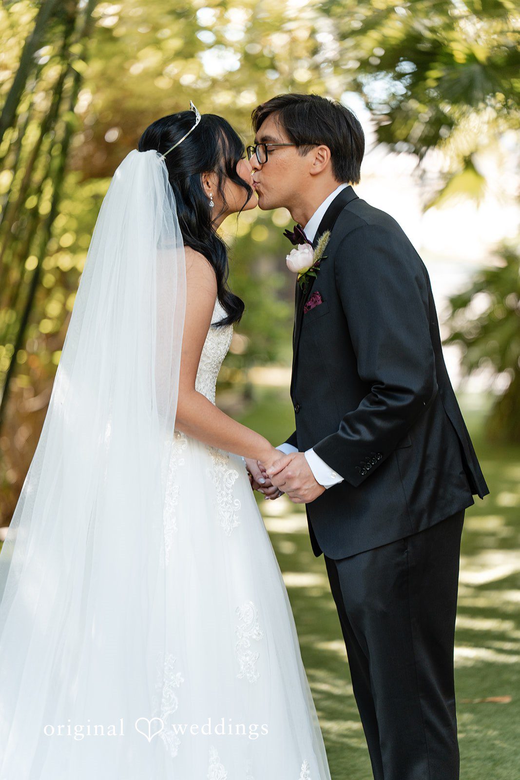 The couple shares a kiss